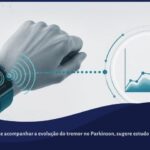 Ilustração de um pulso usando um smartwatch com ondas de sinal conectadas a um gráfico de progressão ao longo do tempo, representando monitoramento contínuo do tremor no Parkinson.
