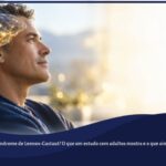 Pessoa adulta de perfil, com uma representação luminosa do cérebro e conexões neurais douradas; um frasco âmbar aparece discretamente ao fundo.